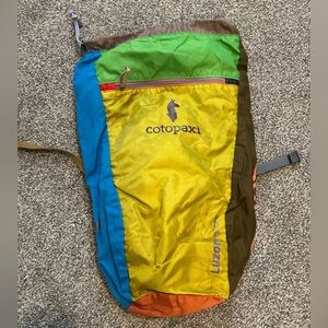 Cotopaxi Colorful Backpack with Yellow, Blue, Brown and Green Accents